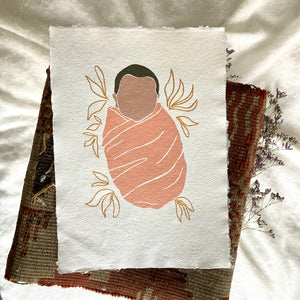 Baby op handgeschept papier
